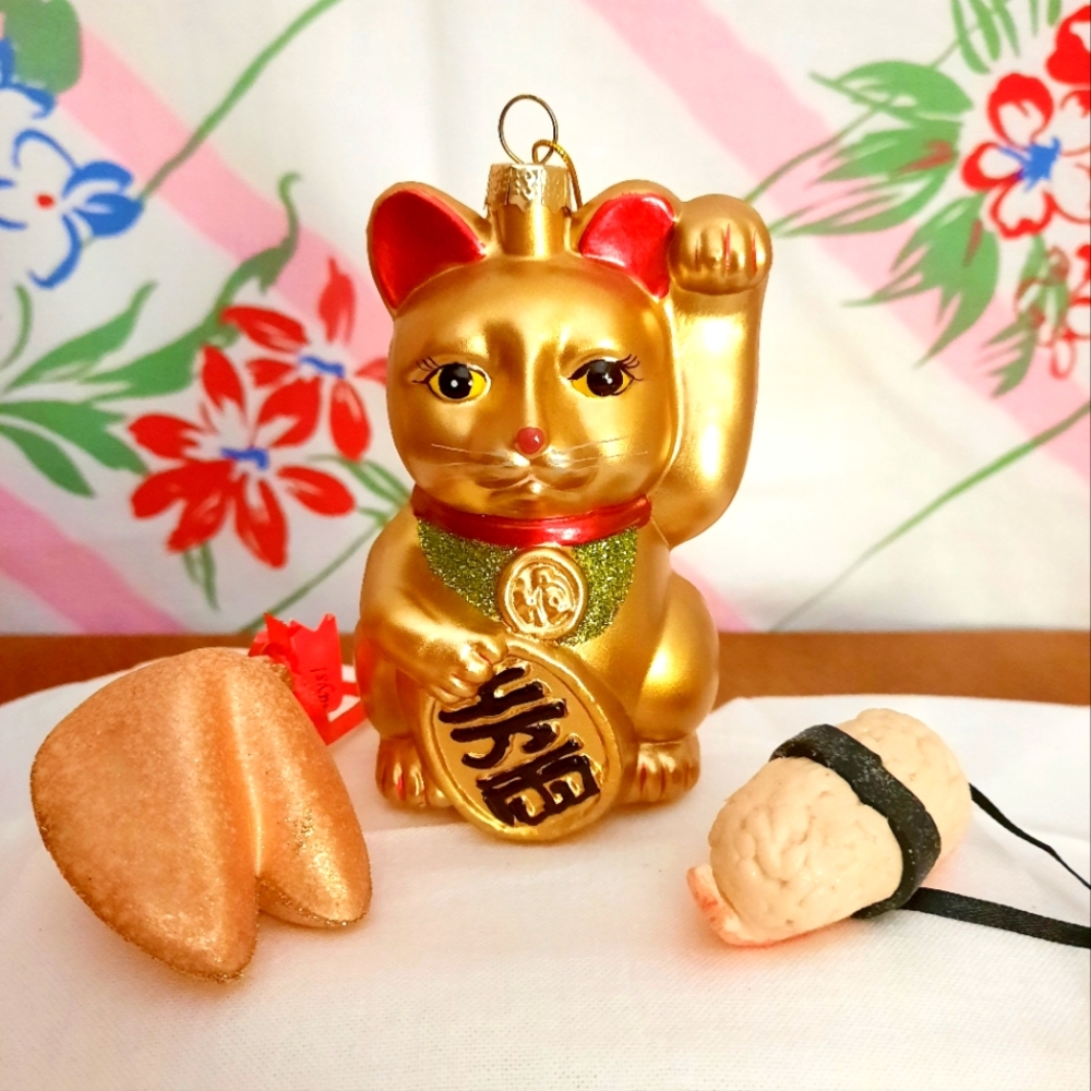 Ornaments.  Gold lucky cat with fortune cookie and sushi.